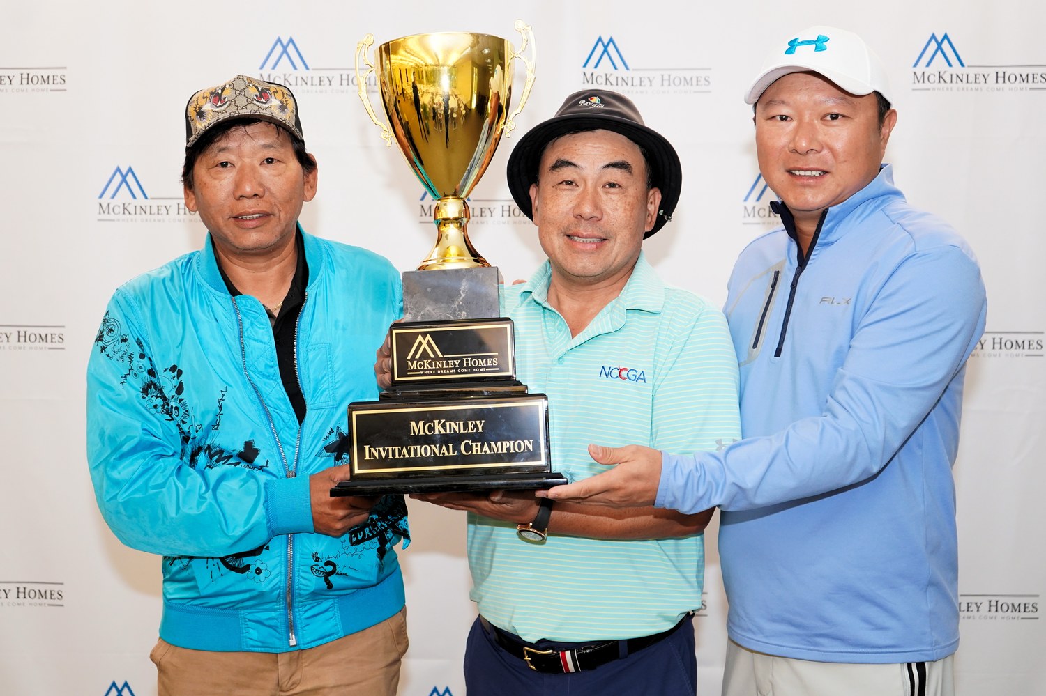 2022 champion Daniel Li with the Invitational Championship cup
