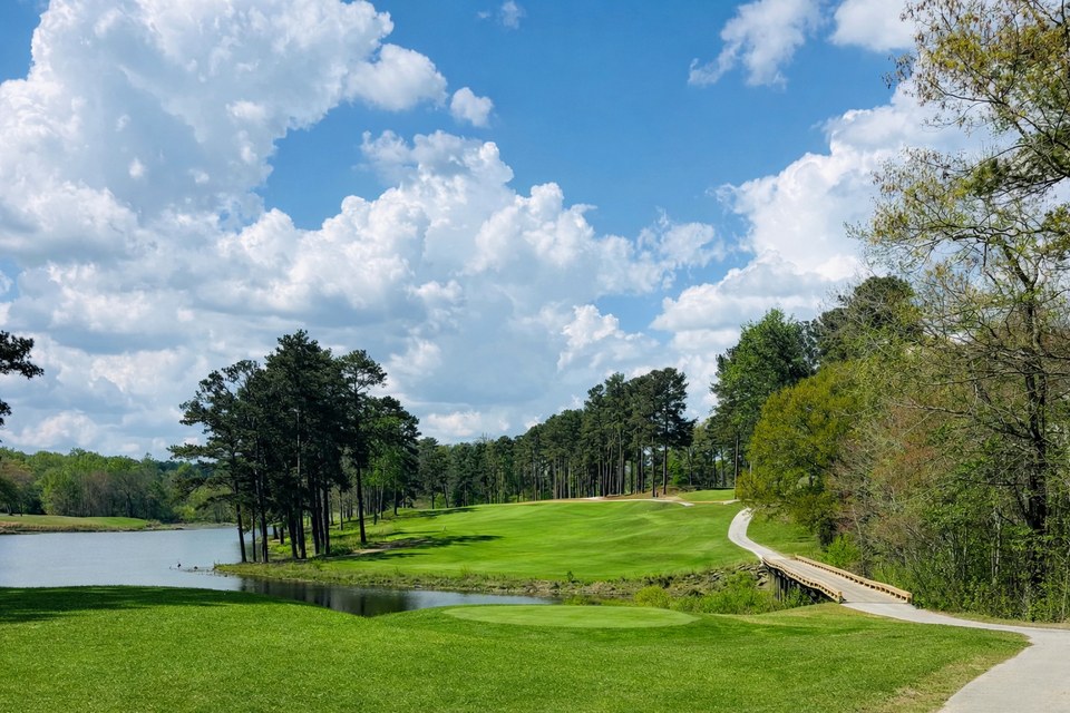 Fairway and footbridge over the lake at Country Club of Gwinnett